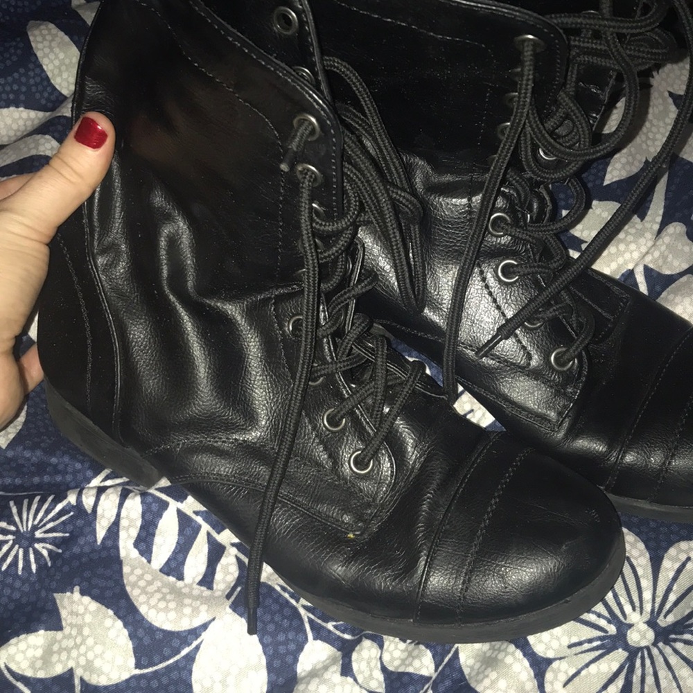 Lightly worn combat boots